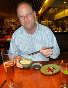 enjoying dinner at the Straits Kitchen in the Singapore Grand Hyatt Hotel
