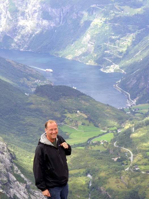At the top of Dalsnibba, overlooking Geiranger, Norway