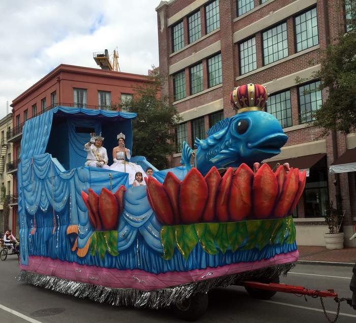 Mardi Gras float in front of Renaissance New Orleans Arts Hotel