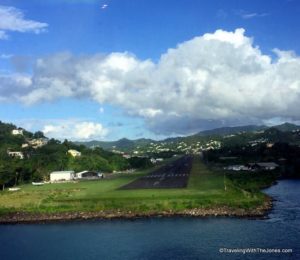 A view of the George F. L. Charles Airport runway from the deck of a cruise ship departing from Castries, Saint Lucia