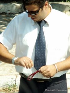 local man using his "worry beads" - Corfu, Greech