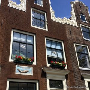 gable stone and hook on historic building, Amsterdam