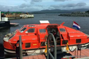 tender delivers Prinsendam cruise guests to new dock in Bantry, Ireland