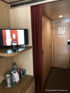 tv and mini-bar - ocean-view stateroom on Holland America's Veendam