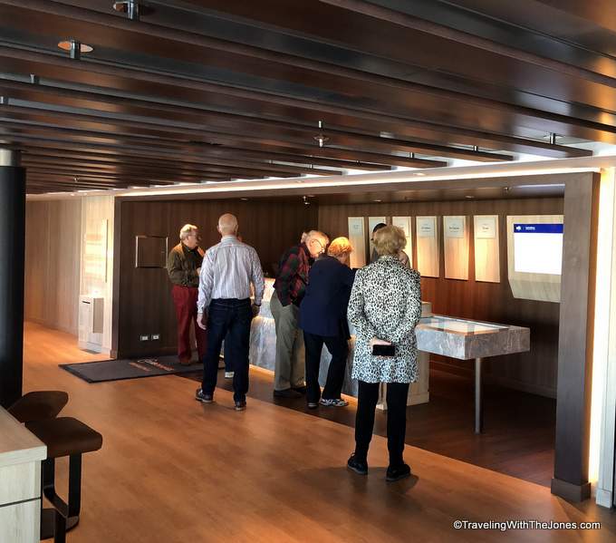 Shore excursions desk at EXC Crows Nest on Nieuw Statendam